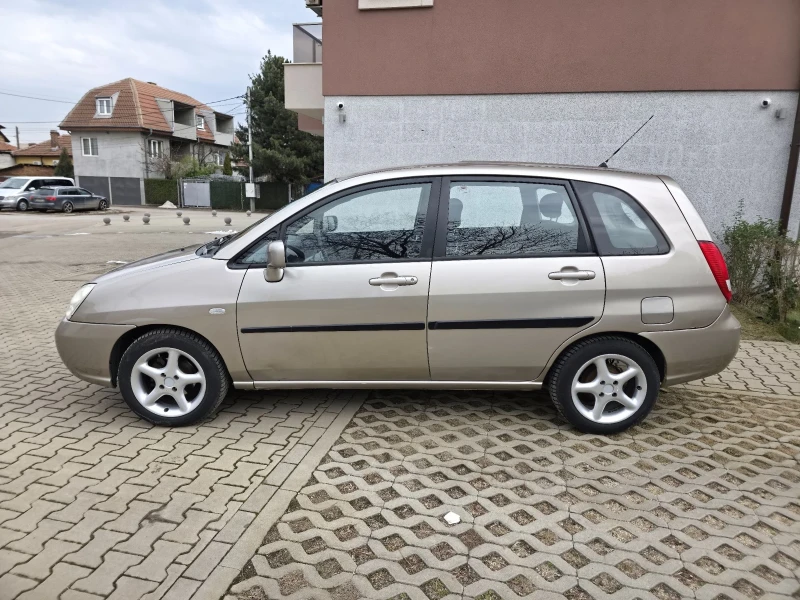 Suzuki Liana 4х4, снимка 8 - Автомобили и джипове - 49304576