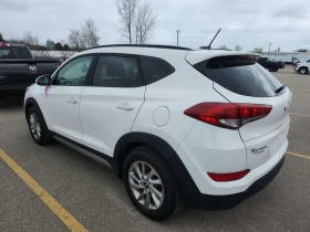 Hyundai Tucson Awd 4dr 2.0l Se/CARFAX/Подгрев/Кожа/Панорама - 11550 € / 22589.84 лв. - 39499301 4