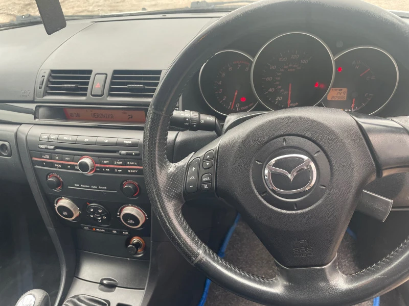 Mazda 3 1.6i 105кс., снимка 7 - Автомобили и джипове - 34706545