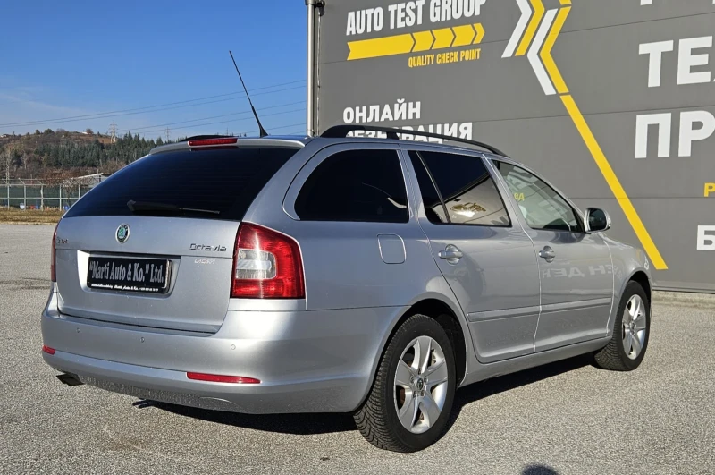 Skoda Octavia 1.6 TDI 4x4, снимка 9 - Автомобили и джипове - 46323311