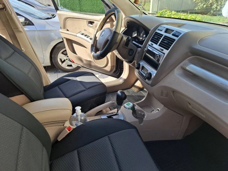 Kia Sportage, снимка 10 - Автомобили и джипове - 48187135