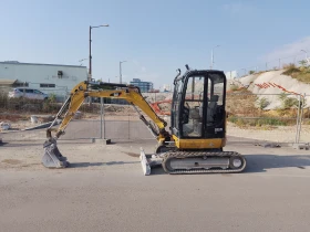 Обява за продажба на Багер Caterpillar 302.7D ~28 020 EUR - изображение 1
