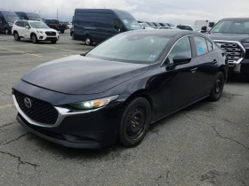 ������ Mazda 3