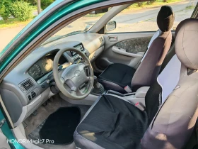 Toyota Corolla Toyota Corolla 1.3i 86 к.с. Климатик / Поддържана - 1100 € / 2151.41 лв. - 93120788 7