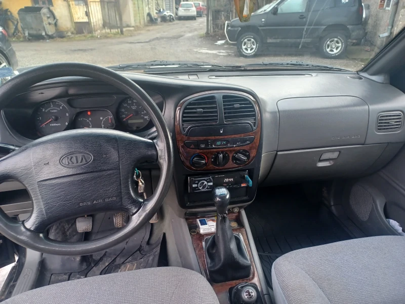 Kia Sportage, снимка 12 - Автомобили и джипове - 48869853