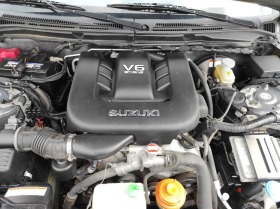 Suzuki Grand vitara 2, 7V6, снимка 13 - Автомобили и джипове - 44760645