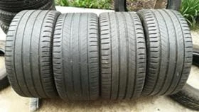 Гуми Летни 295/35R21, снимка 1