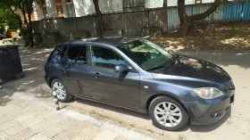 Mazda 3, снимка 14