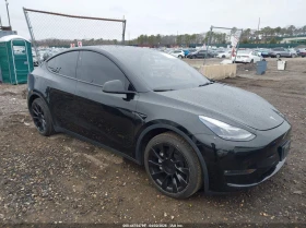 ������ Tesla Model Y