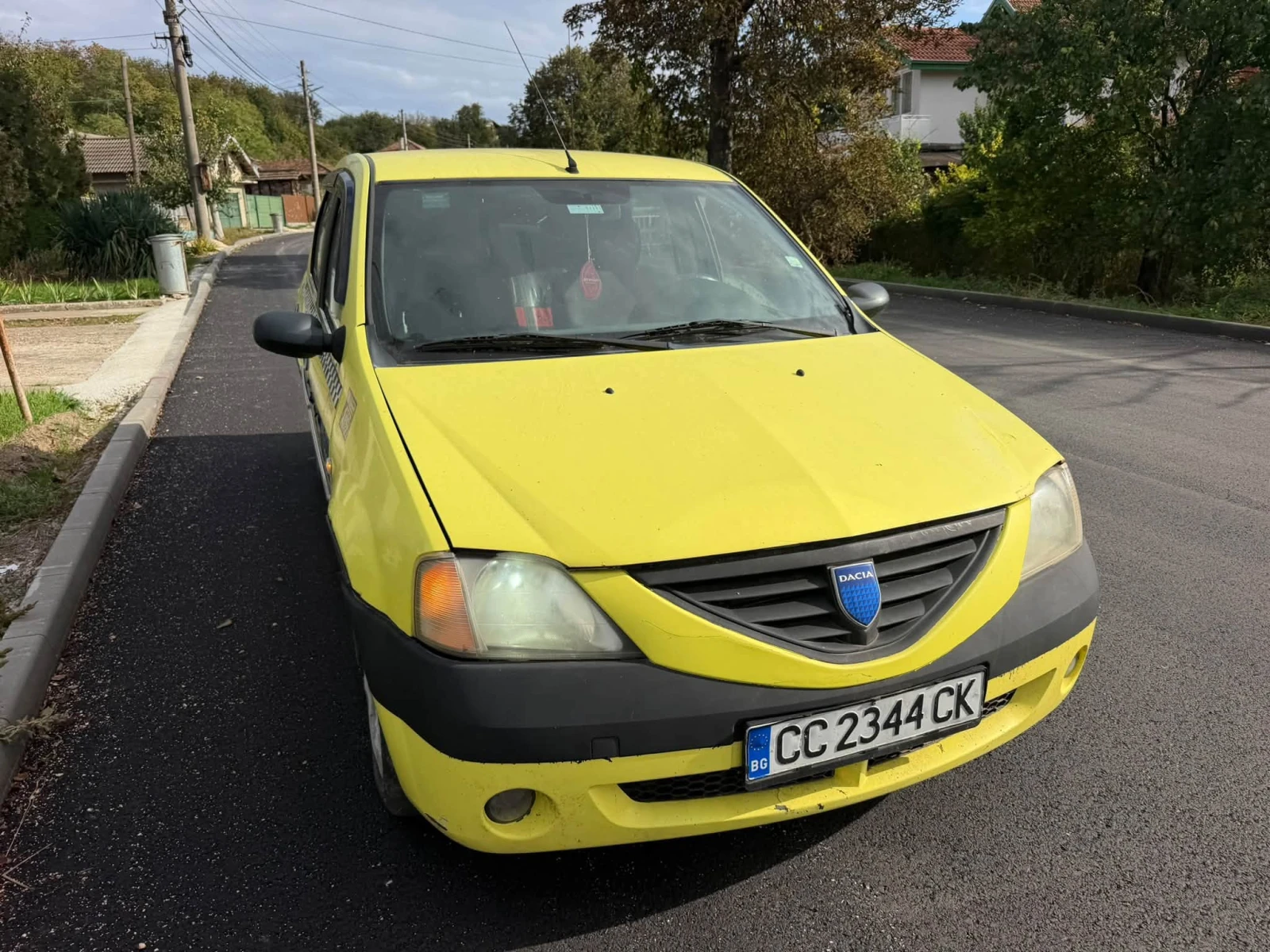 Dacia Logan 1.6i klima gaz, снимка 4 - Автомобили и джипове - 52930104