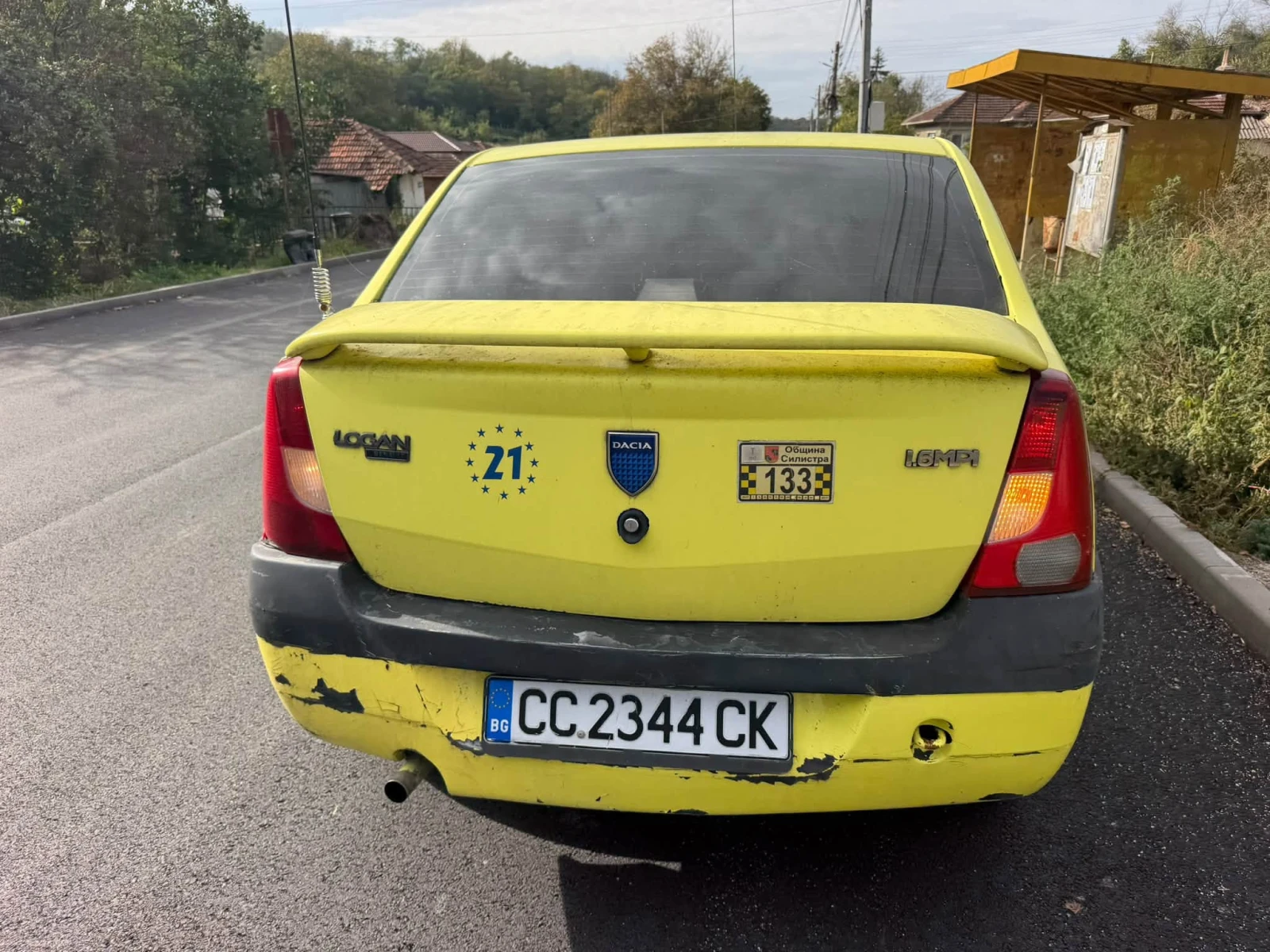 Dacia Logan 1.6i klima gaz, снимка 13 - Автомобили и джипове - 52930104