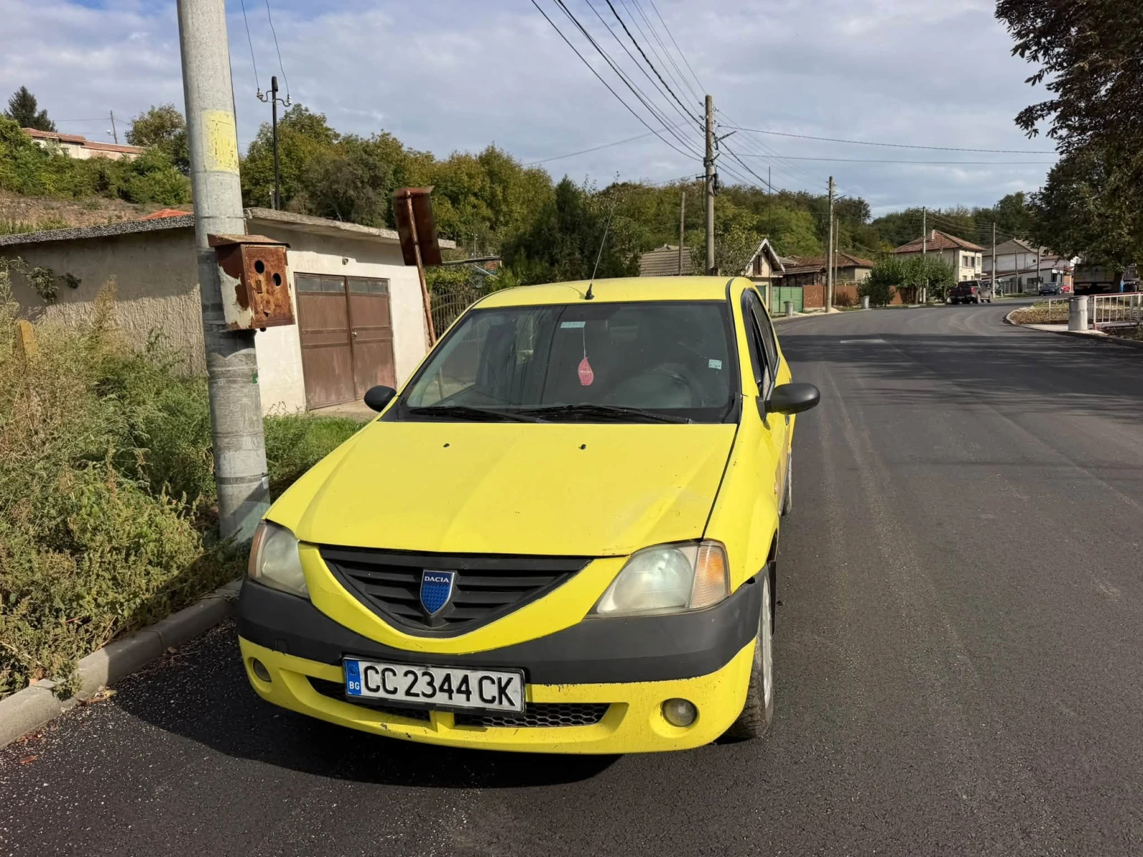 Dacia Logan 1.6i klima gaz, снимка 11 - Автомобили и джипове - 52930104