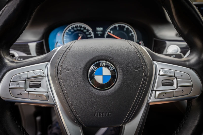 BMW 740 B&W/LASER/ЧАСТНА, снимка 14 - Автомобили и джипове - 51290192