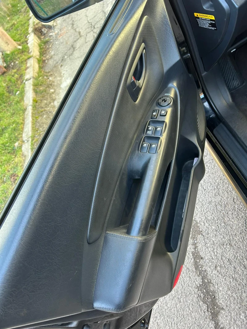 Hyundai Tucson 2.0 газ/бензин, снимка 9 - Автомобили и джипове - 53296357