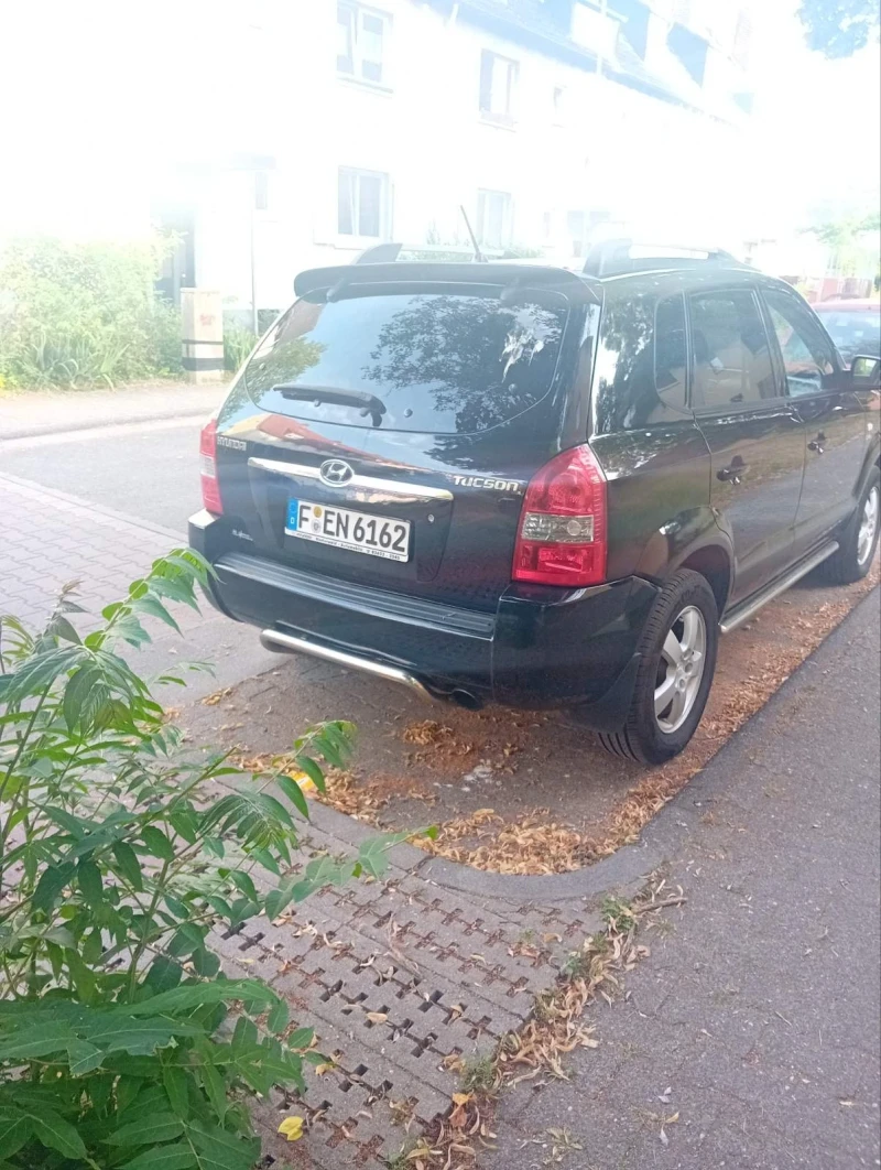 Hyundai Tucson 2.0 газ/бензин, снимка 8 - Автомобили и джипове - 52892947