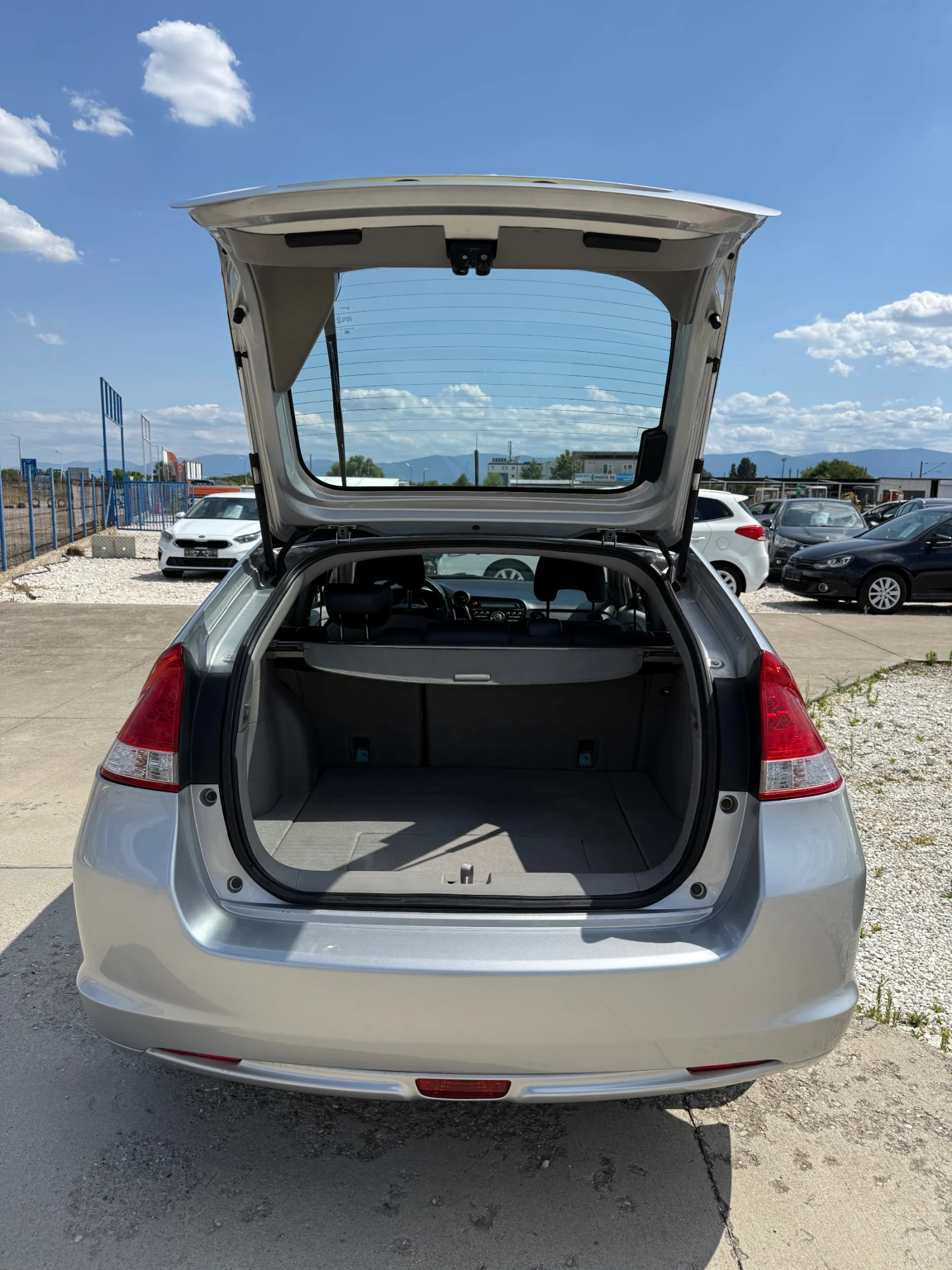Honda Insight 1.3 HYBRID, снимка 14 - Автомобили и джипове - 55395939