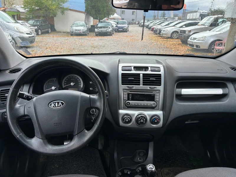 Kia Sportage 2.0-газ, снимка 9 - Автомобили и джипове - 52318655