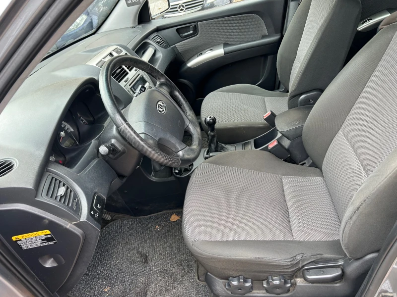 Kia Sportage 2.0-газ, снимка 13 - Автомобили и джипове - 52318655
