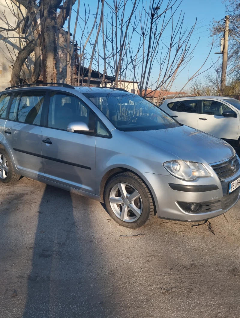 VW Touran 1.9 105 коня 7 местен, снимка 17 - Автомобили и джипове - 52861915