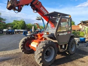 Телескопичен товарач Manitou MVT935, снимка 1