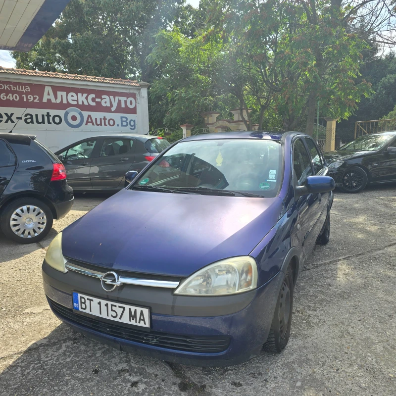 Opel Corsa 1.0i , снимка 11 - Автомобили и джипове - 47335527