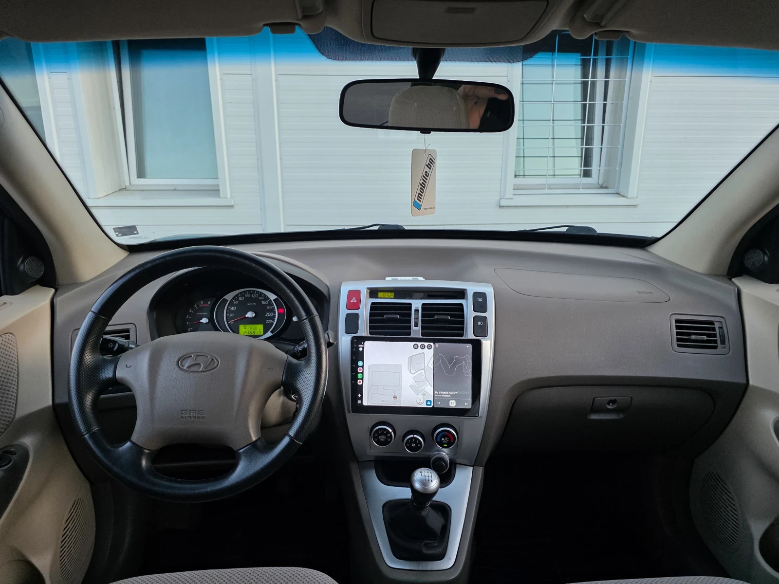 Hyundai Tucson 2.0 CRDI, снимка 12 - Автомобили и джипове - 55081698