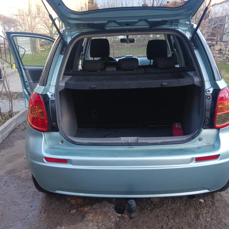 Suzuki SX4, снимка 15 - Автомобили и джипове - 49379494