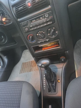 Opel Astra 1.6i ESKLUZIVE АУТОМАТТ , снимка 13