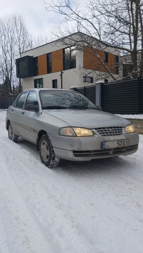 Kia Avella delta Седан, снимка 11