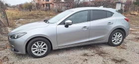 ������ Mazda 3