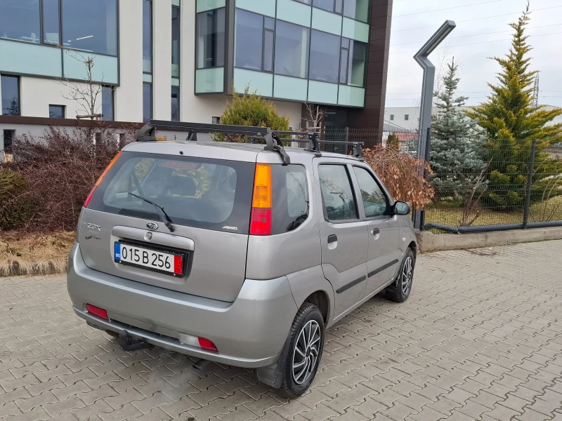 Subaru G3x justy 1.5i* (100кс)* * 4x4* НОВ ВНОС* * , снимка 14 - Автомобили и джипове - 53260966