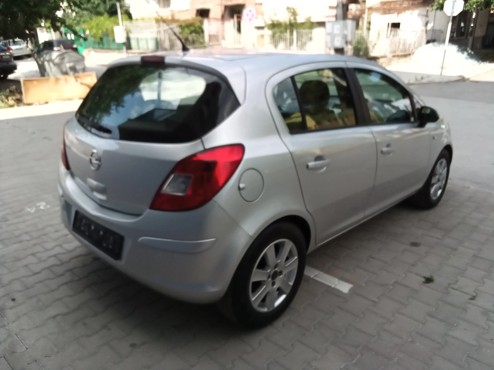 Opel Corsa 1.2i-86kc. Euro5, снимка 7 - Автомобили и джипове - 55329595