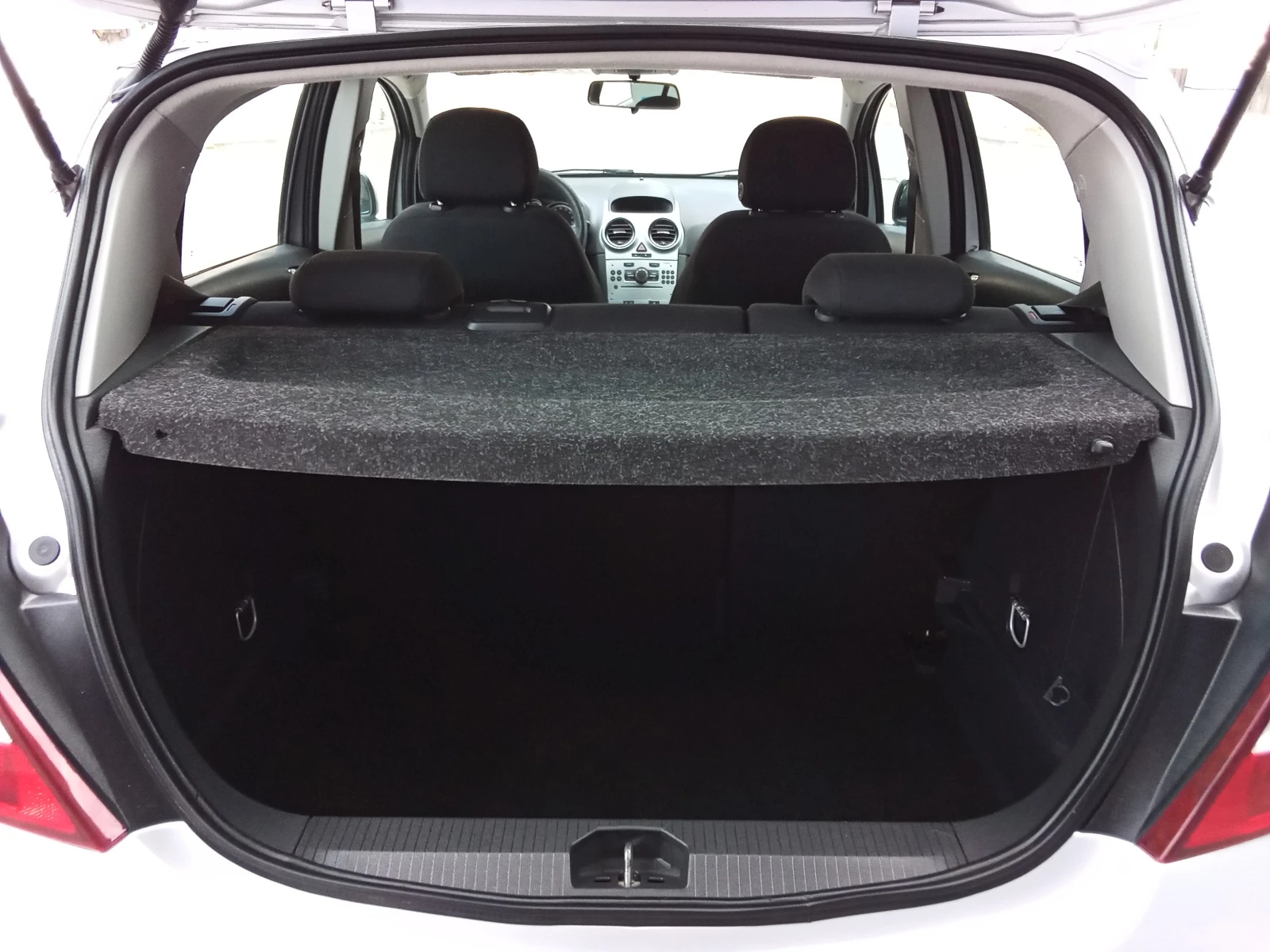 Opel Corsa 1.2i-86kc. Euro5, снимка 13 - Автомобили и джипове - 55329595
