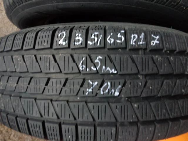 Гуми Зимни 235/65R17, снимка 4 - Гуми и джанти - 12732830