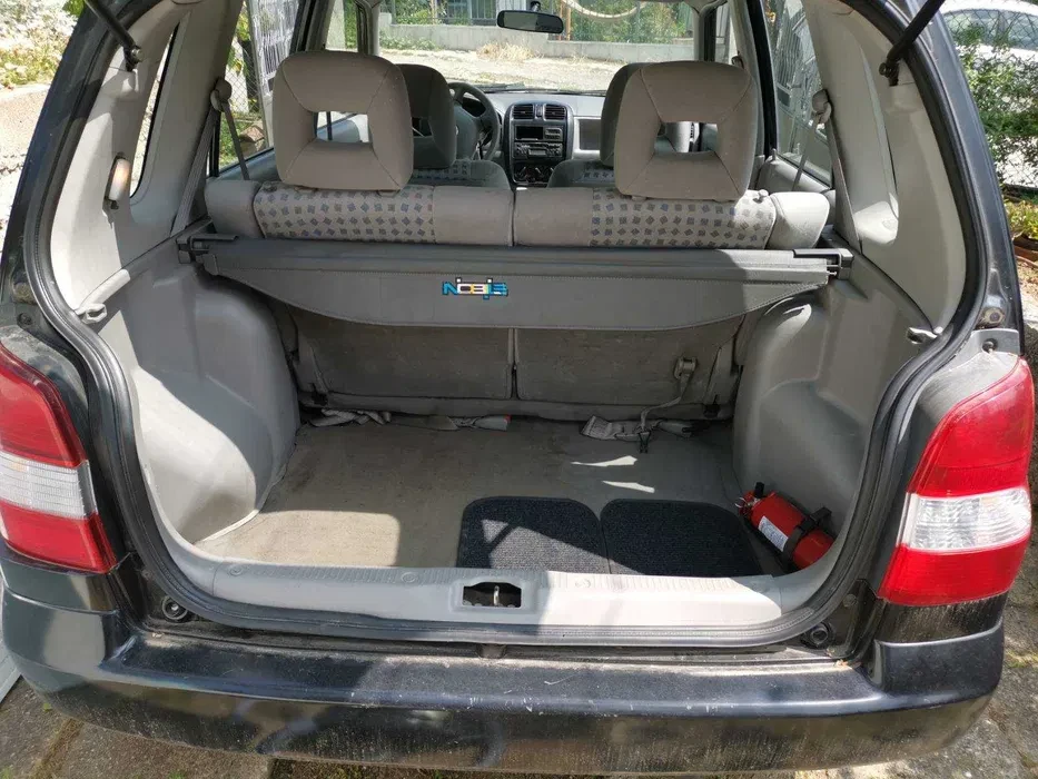 Mazda Demio 2000 - изображение 4