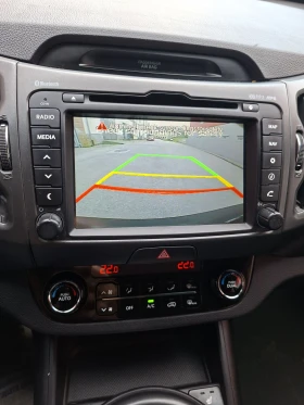 Kia Sportage 2.0CRDI, 4х4 , Автомат , Кожа , Нави Камера., снимка 15