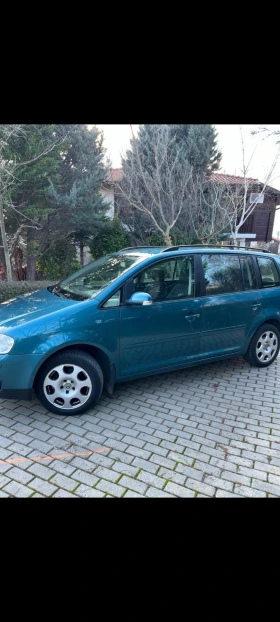 VW Touran  VW Touran 7 местен 2.0 TD?  перфектно състояние  - 2800 € / 5476.32 лв. - 83941280 5