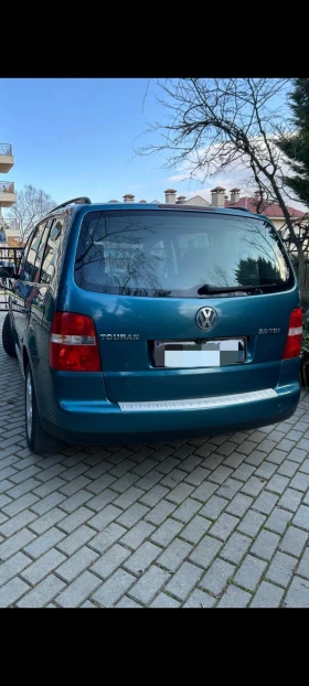 VW Touran  VW Touran 7 местен 2.0 TD?  перфектно състояние  - 2800 € / 5476.32 лв. - 83941280 4