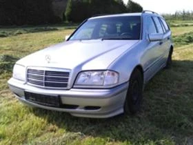       ,   Mercedes-Benz C 200