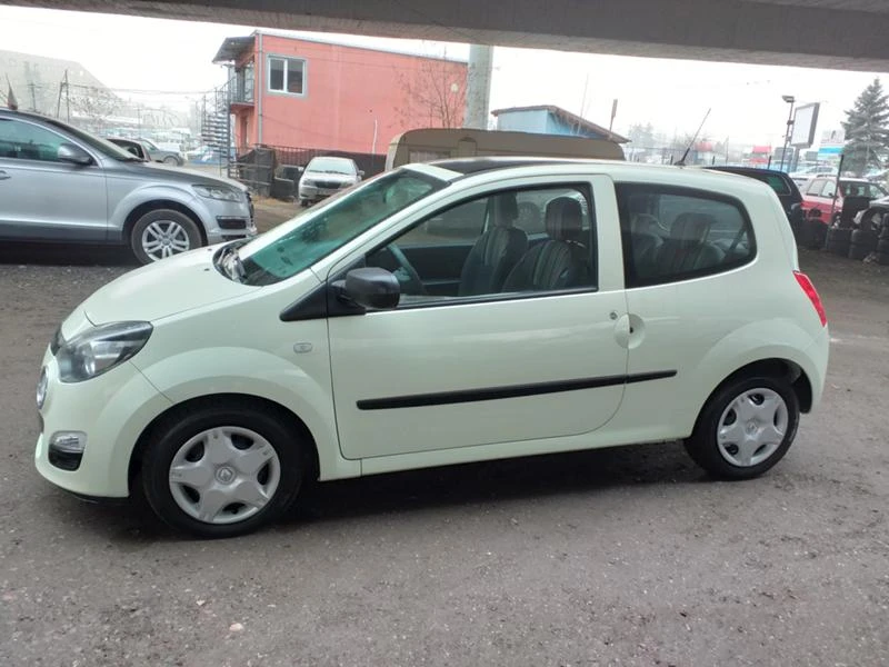 Renault Twingo 1,2i   като ново, снимка 10 - Автомобили и джипове - 45539304