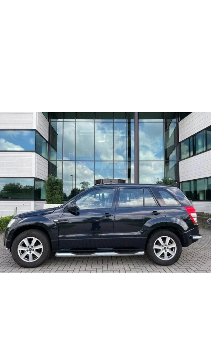 Suzuki Grand vitara 2.0, снимка 5 - Автомобили и джипове - 47017307