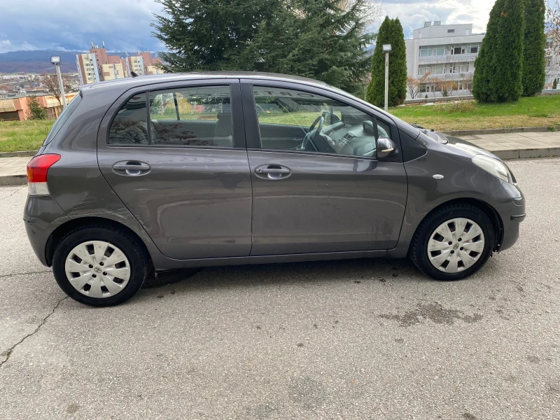 Toyota Yaris 1.33 i, снимка 15 - Автомобили и джипове - 53024081