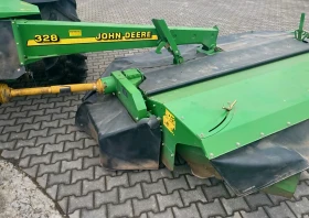      John Deere John Deere 328 /Kuhn FC283 / 2.85 