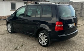     VW Touran 2.0 TDI 170kc 7-   