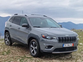 ������ Jeep Cherokee