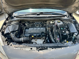 Opel Astra 1.4i EcoGas Sport Tourer LPG Face , снимка 17