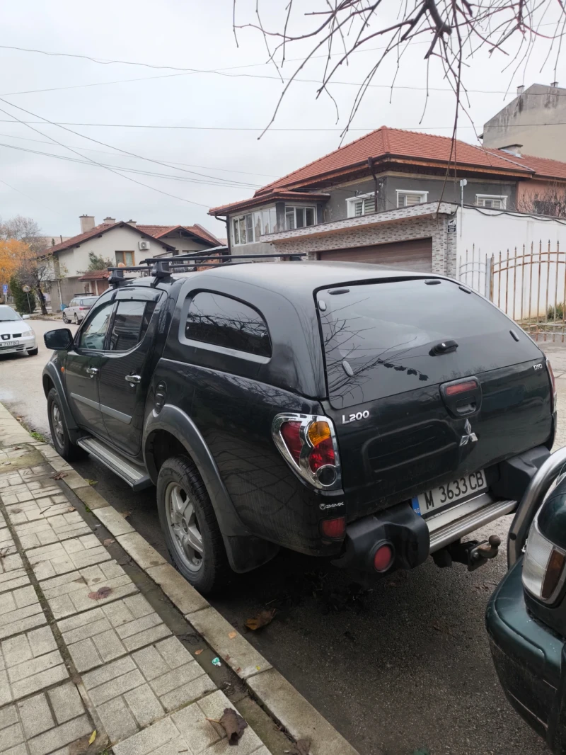 Mitsubishi L200, снимка 14 - Автомобили и джипове - 52665404