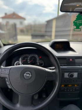 Opel Meriva 1.6 БЕНЗИН* КЛИМАТИК - 2750 € / 5378.53 лв. - 24826909 11