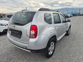 Dacia Duster 1.6 4x4 - 11900 лв. / 6084.37 € - 16189687 4