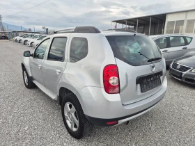 Dacia Duster 1.6 4x4 - 11900 лв. / 6084.37 € - 16189687 6